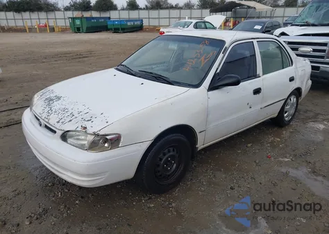 1999 Toyota Corolla Ve z USA, uszkodzony, nr VIN 2T1BR12E9XC159595